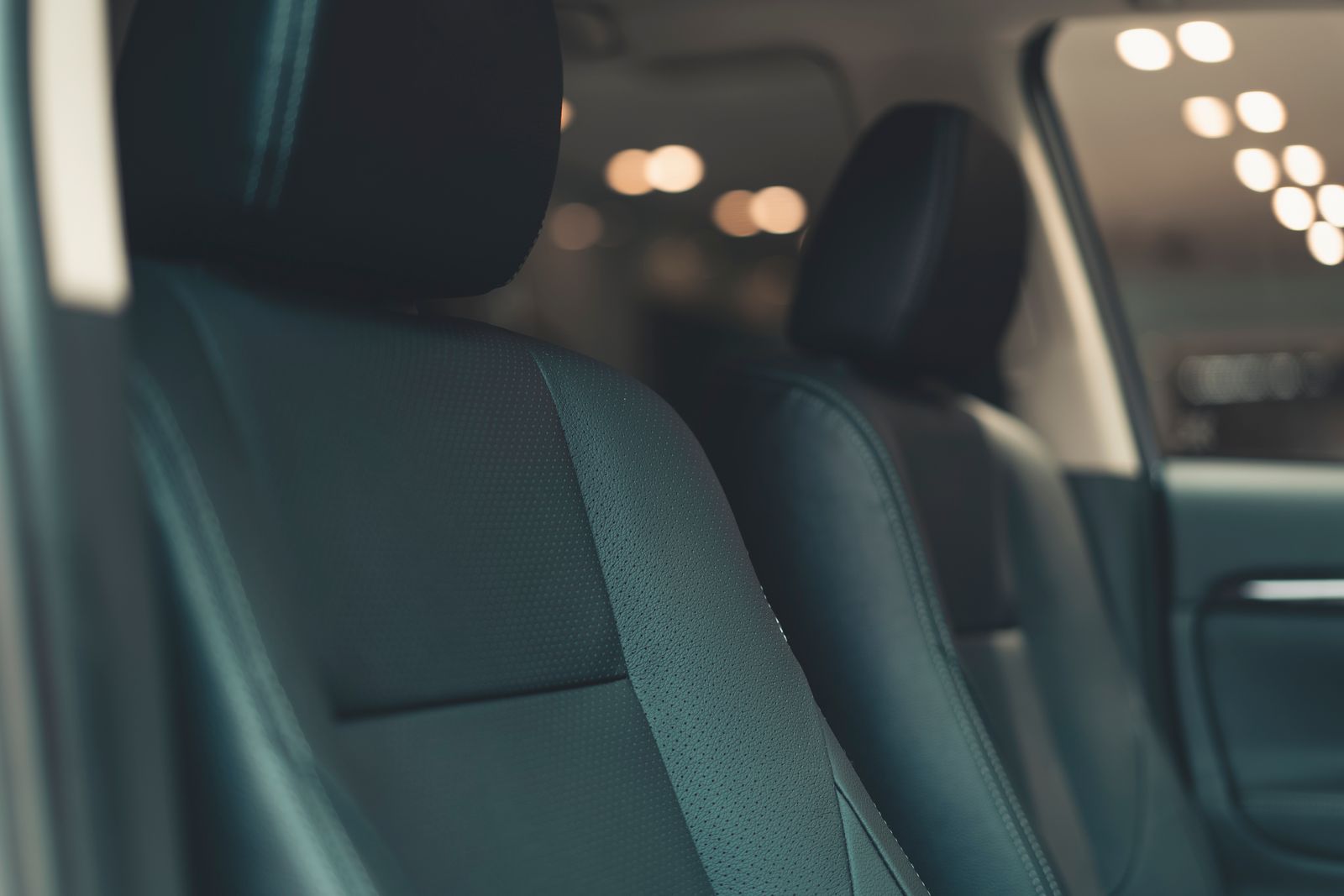 Clean car interior with steering wheel and dashboard